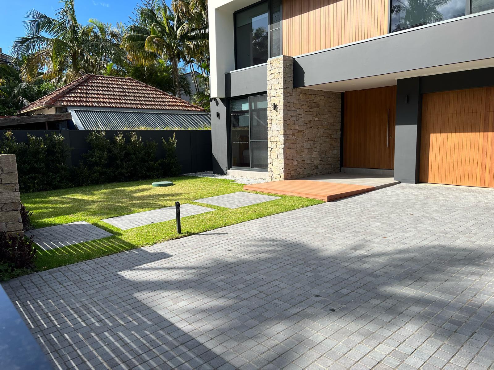Modern grey paver driveway